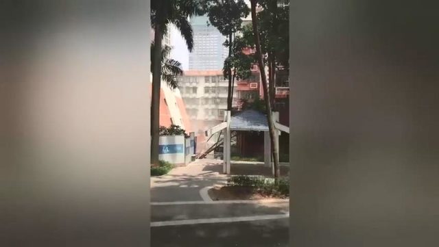 Çin’de bir apartman, birinci katı çökünce yan yattı