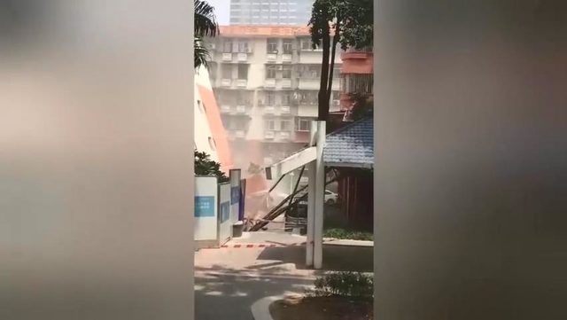 Çin’de bir apartman, birinci katı çökünce yan yattı